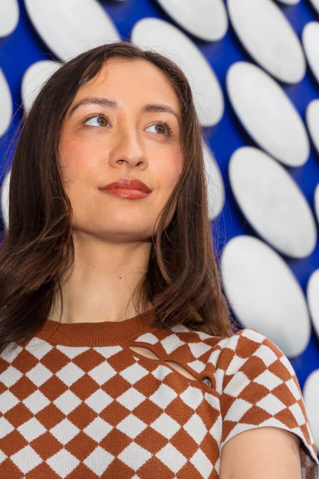 Dr Kerry McInerney (née Mackereth) looking at camera