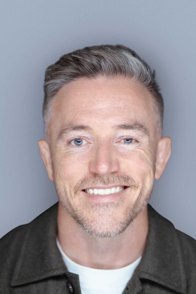 Mike Bates, keynote speaker smiling